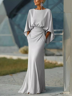 Sophisticated silver batwing sleeve maxi dress with ruched waist and pockets.
