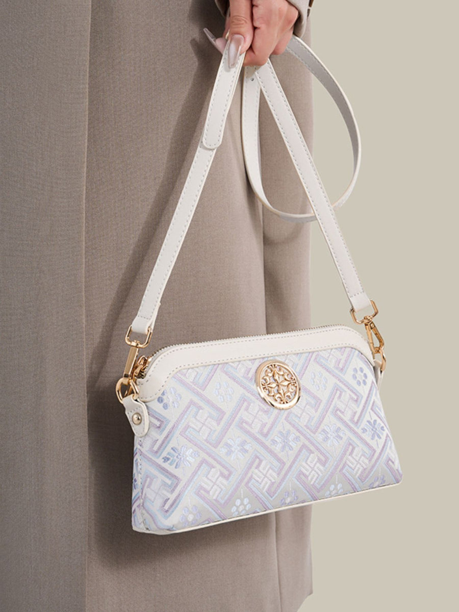 crossbody bag in White with geometric and adjustable strap