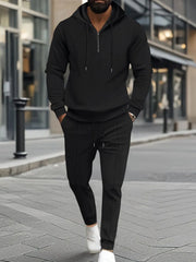 Black textured quarter-zip hoodie and matching jogger pants loungewear set