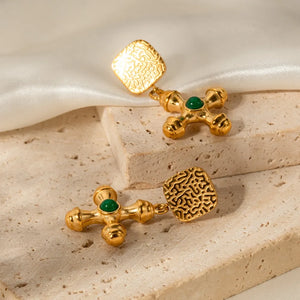 Textured cross drop earrings with green stones, 18K gold-plated.