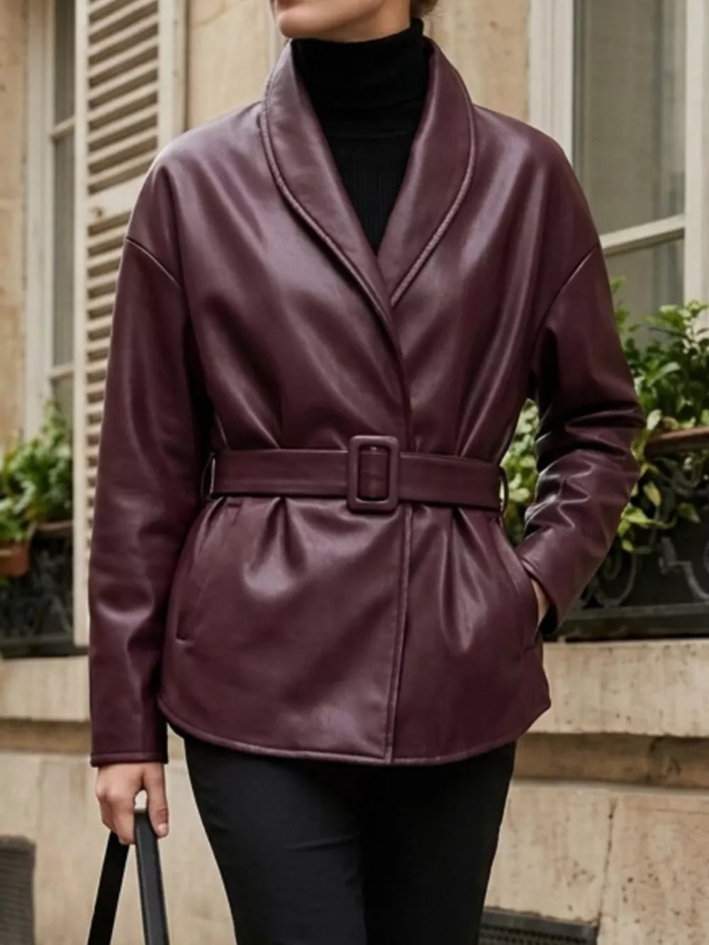 burgundy leather jacket with seam detail and long sleeve