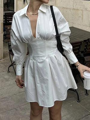 white mini dress with mini and back-zip