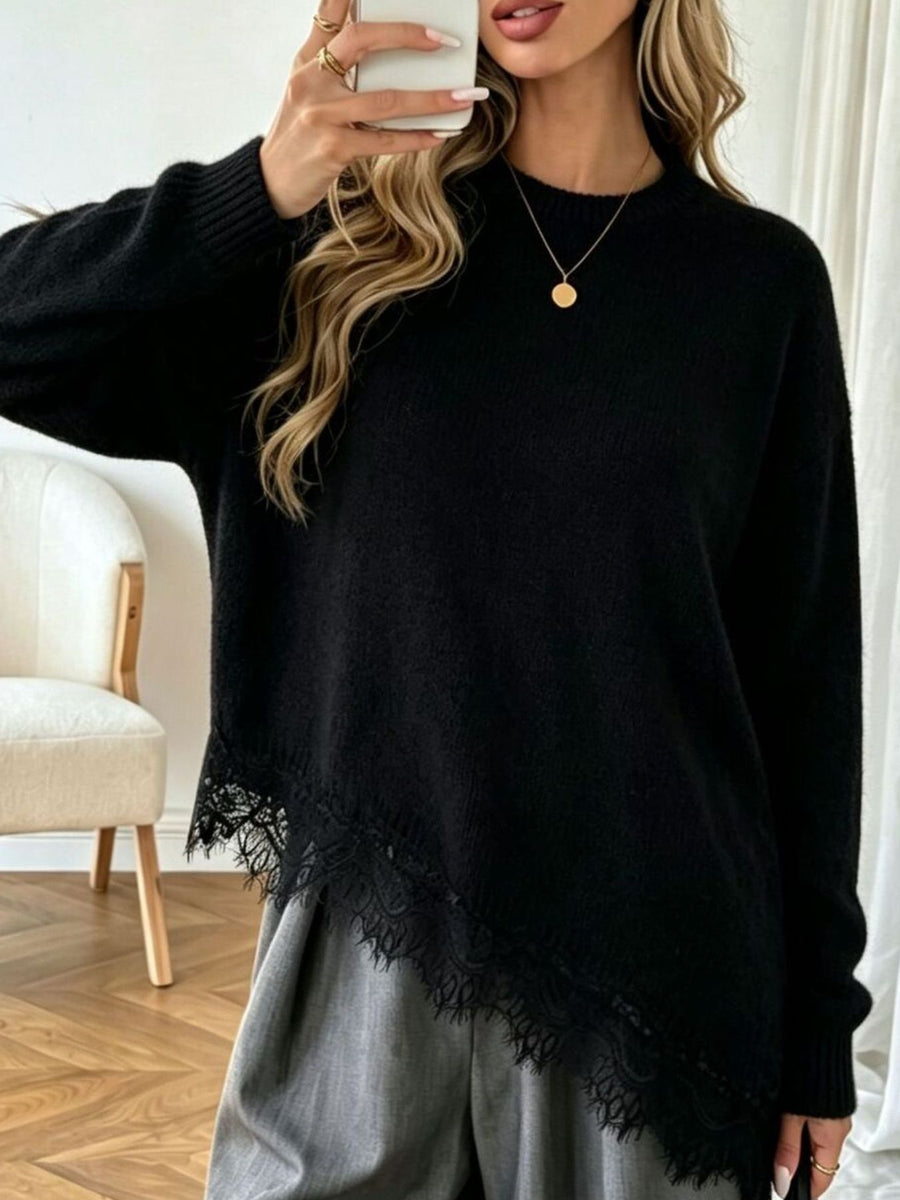 pullover sweater in black featuring lace and loose fit