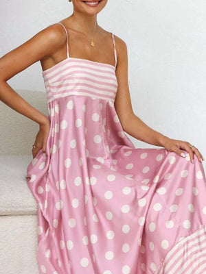 Blush pink maxi dress with spaghetti straps, square neckline, polka dot skirt and striped bodice.