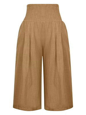 Brown linen culottes with smocked high waist and pleated front.