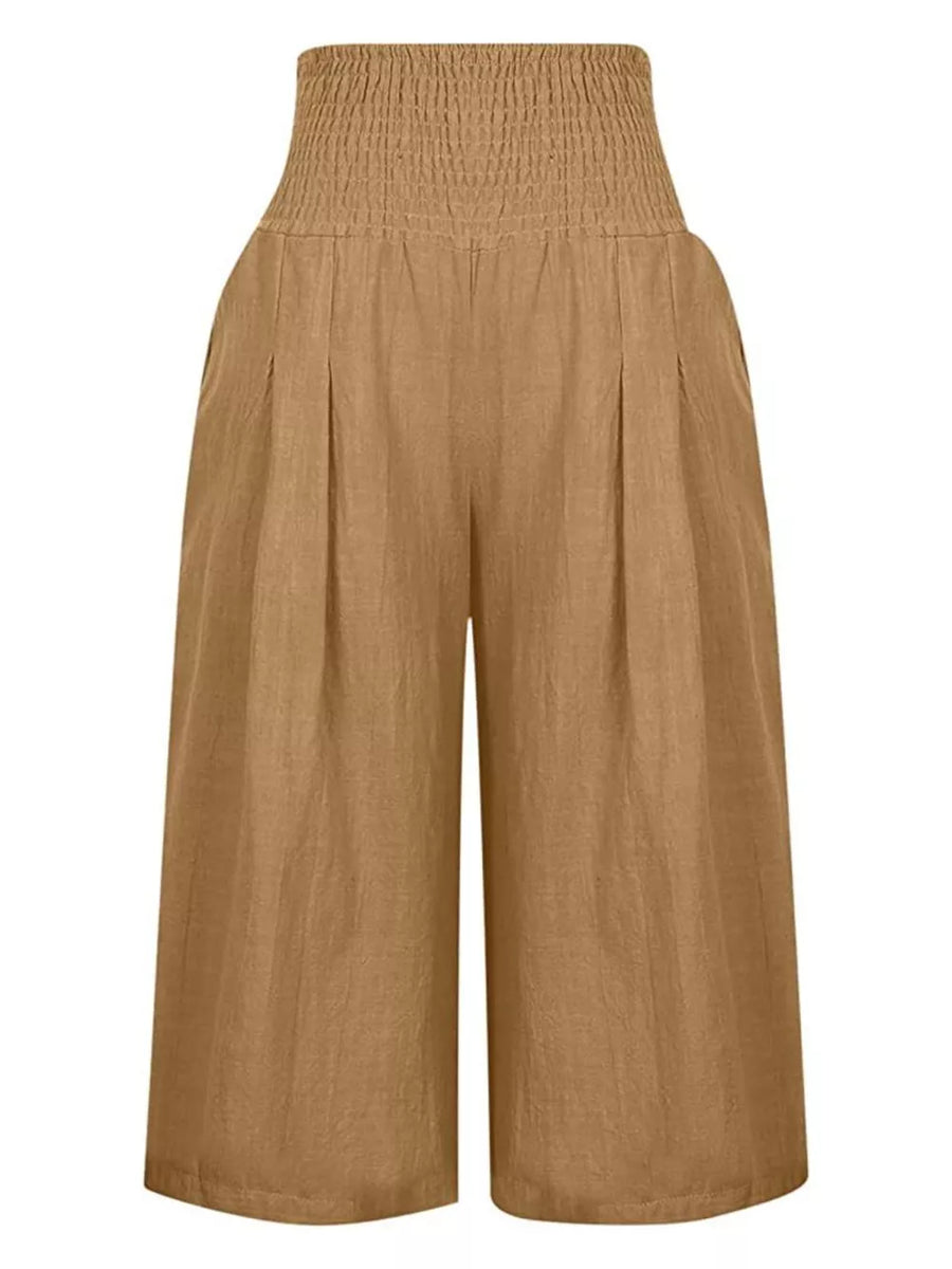 Brown linen culottes with smocked high waist and pleated front.