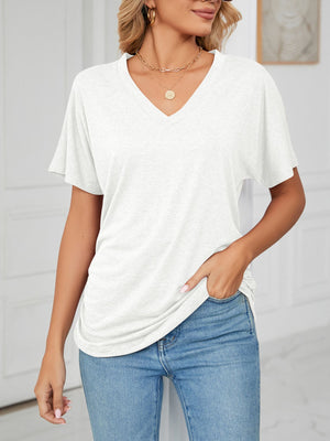 Relaxed white v-neck short sleeve t-shirt with draping detail.