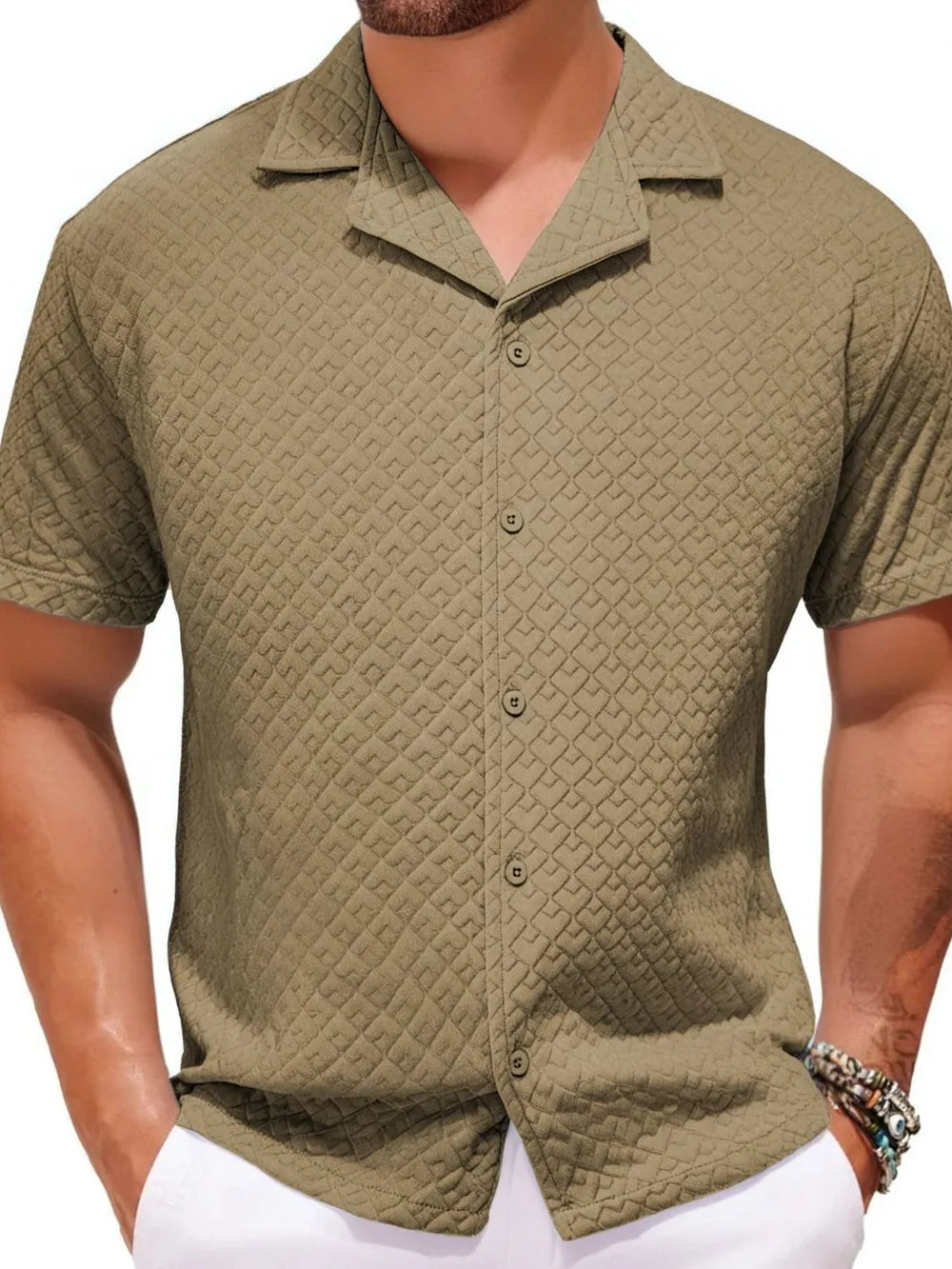 Textured quilted camp collar shirt in khaki with button front and short sleeves.