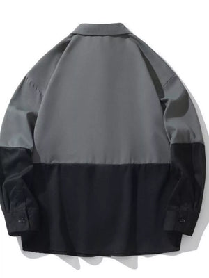Two-tone oversized casual button-down shirt in grey and black color-block.