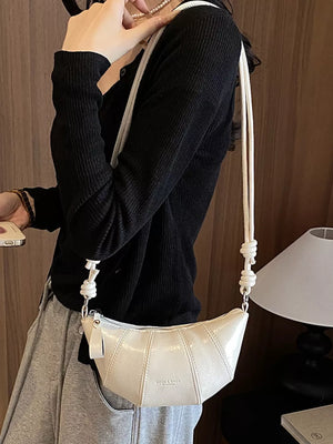 PU Leather Imported Size &amp crossbody bag in ivory with crescent silhouette