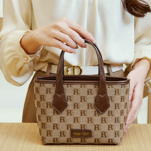 crossbody bag featuring monogram in tan with PU Leather Imported Size &amp texture