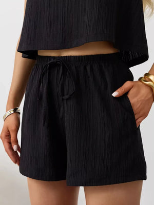 Black textured cotton tank and shorts set with drawstring waist