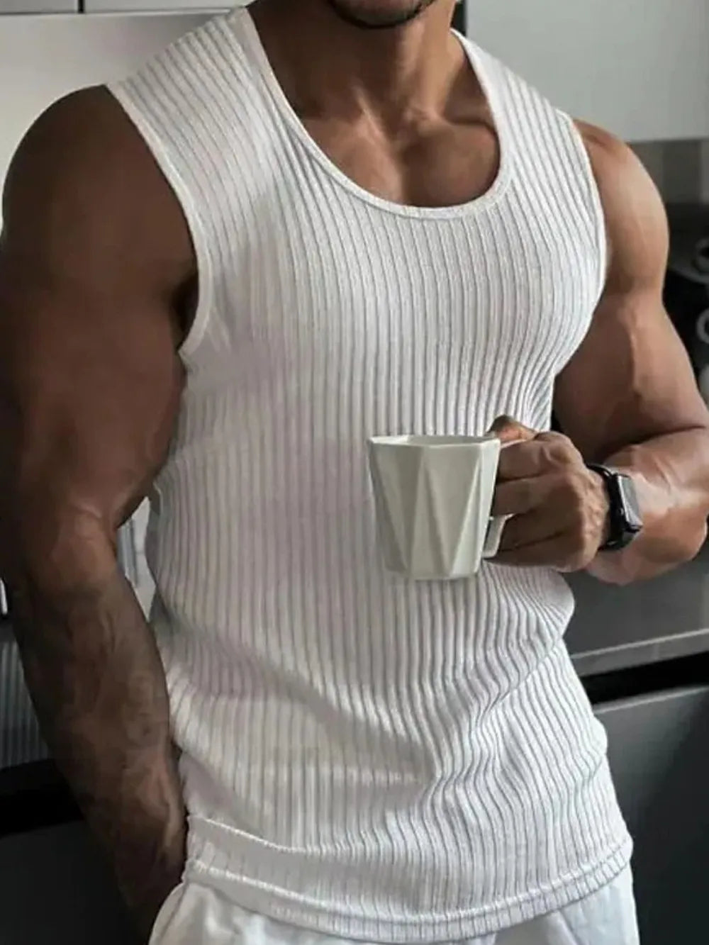 White ribbed athletic fit tank top with scoop neck.
