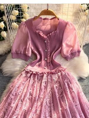 Pink lace-embellished puff sleeve dress with ruffled neckline and button detail