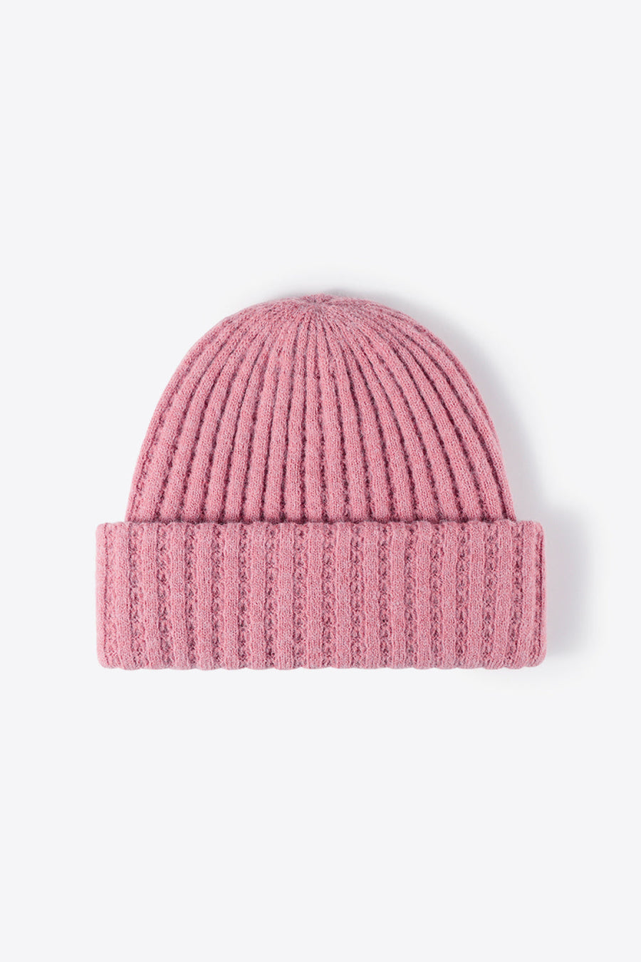 Pink ribbed knit beanie with textured detail