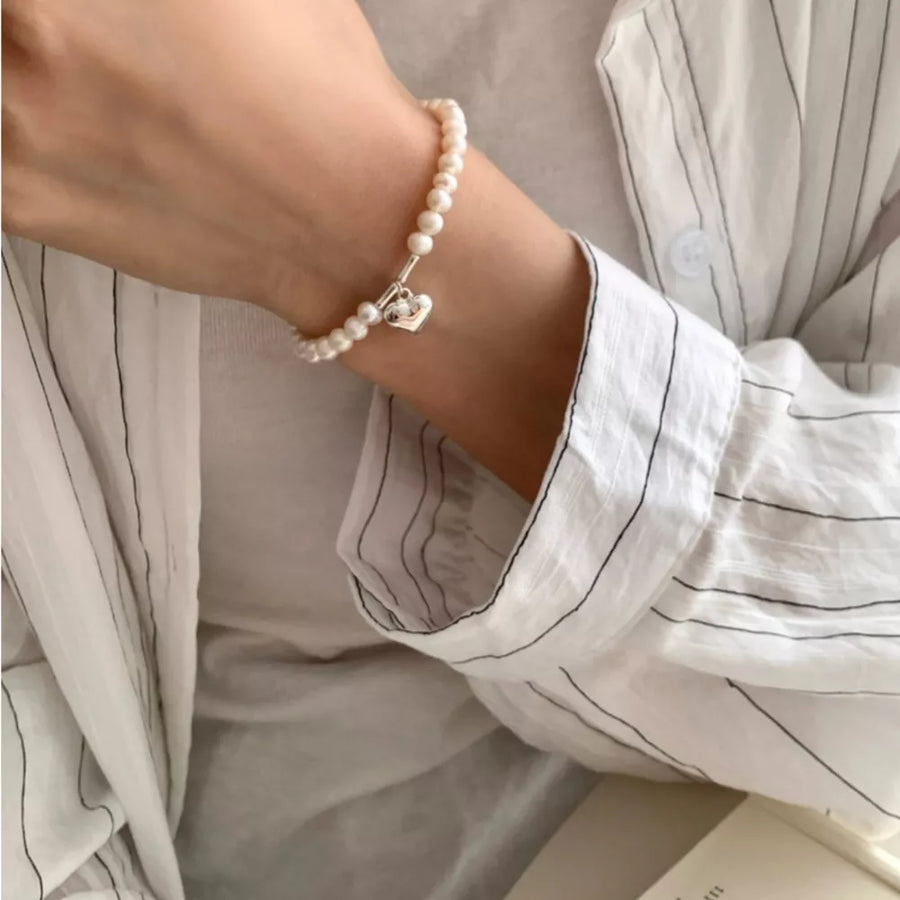 Silver bracelet with pearl beads and not applicable