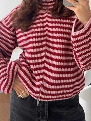 burgundy zip-up sweater featuring zipper and striped