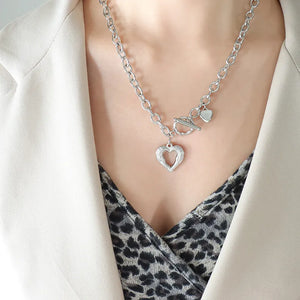 Silver open heart chain necklace with toggle clasp and small heart charm