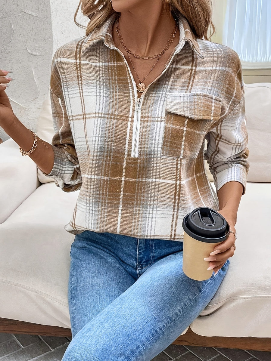 Plaid zip-through utility blouse in camel with a chest pocket and collared neckline.