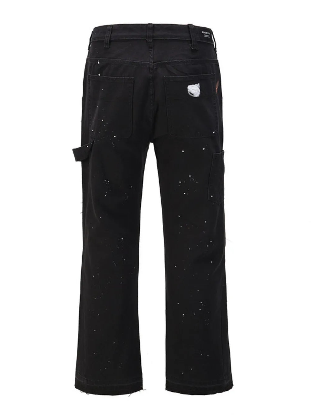 Black carpenter trousers with white paint splatters and distressed detail.