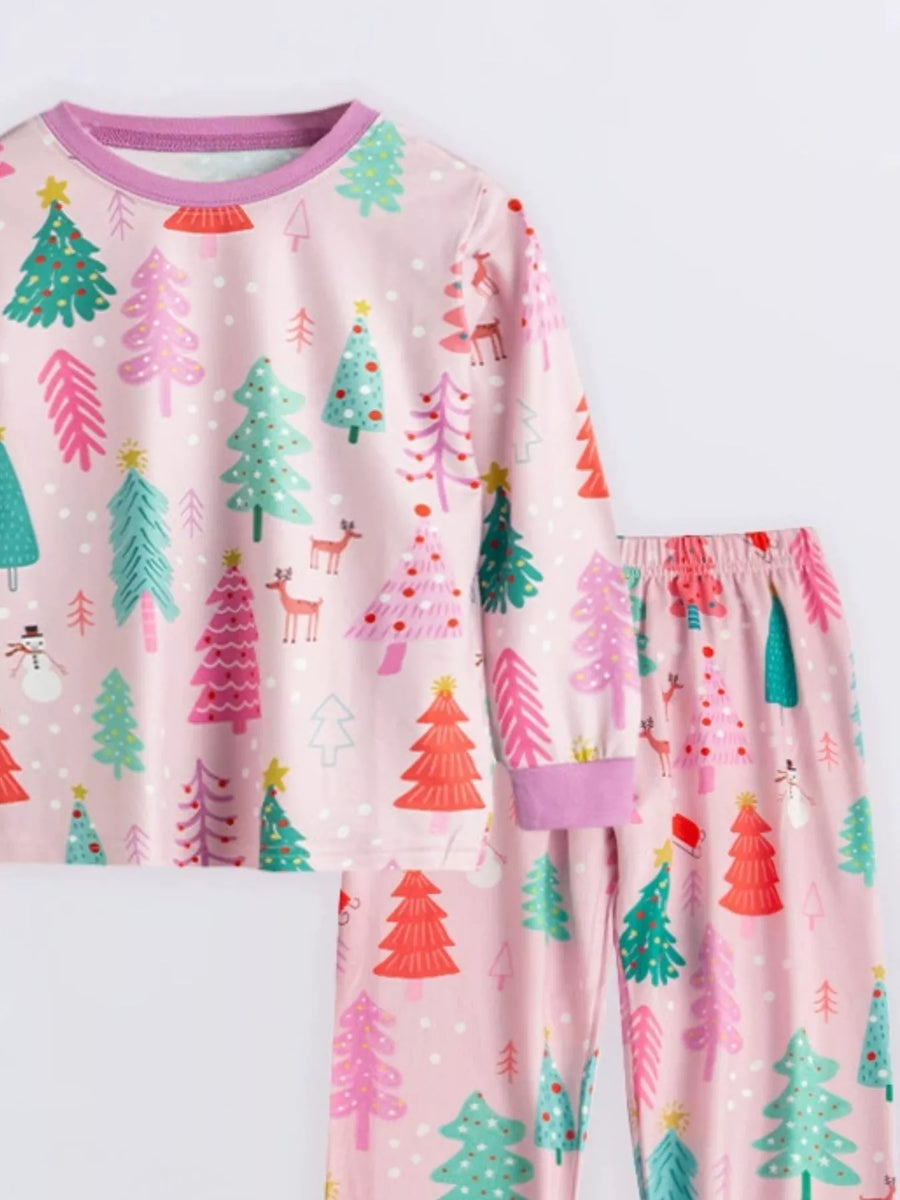 Baby pajama set in light yellow with Christmas tree print, long sleeves, and crew neck.