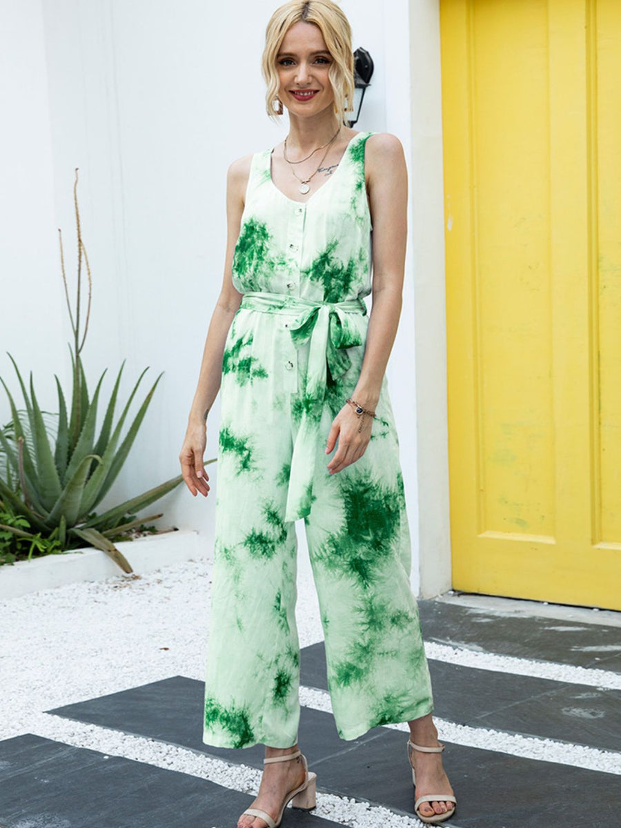 Green tie-dye button-down jumpsuit with tie waist and wide legs.