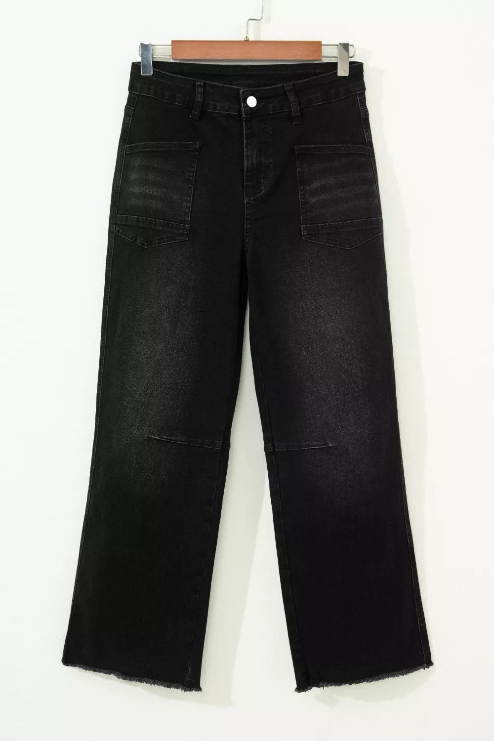 Black cotton blend cropped jeans with raw hem and patch pockets
