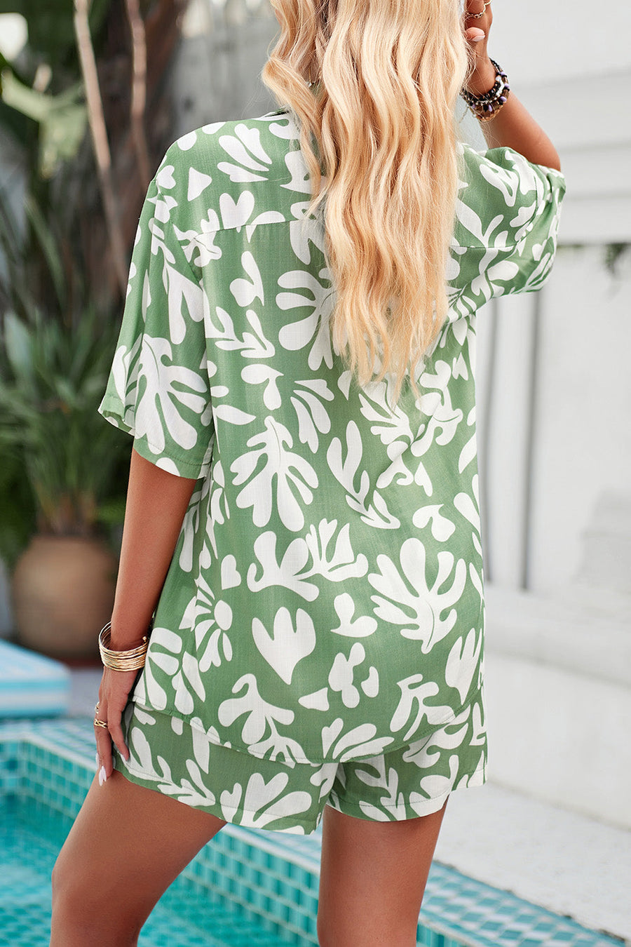 Light Green abstract print resort shirt with short sleeves and matching shorts.