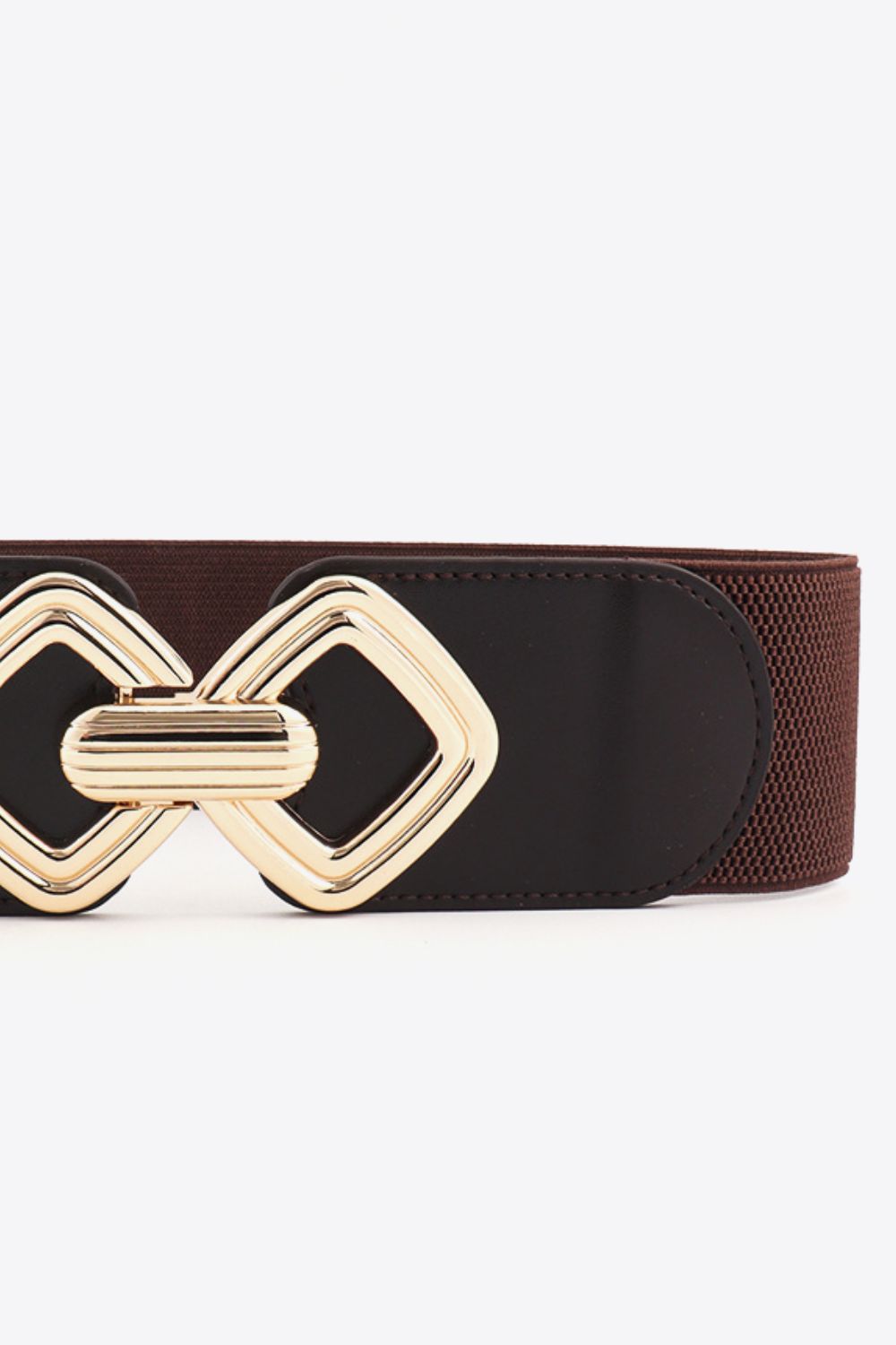 Chocolate elasticated belt with geometric gold buckle and faux leather detail