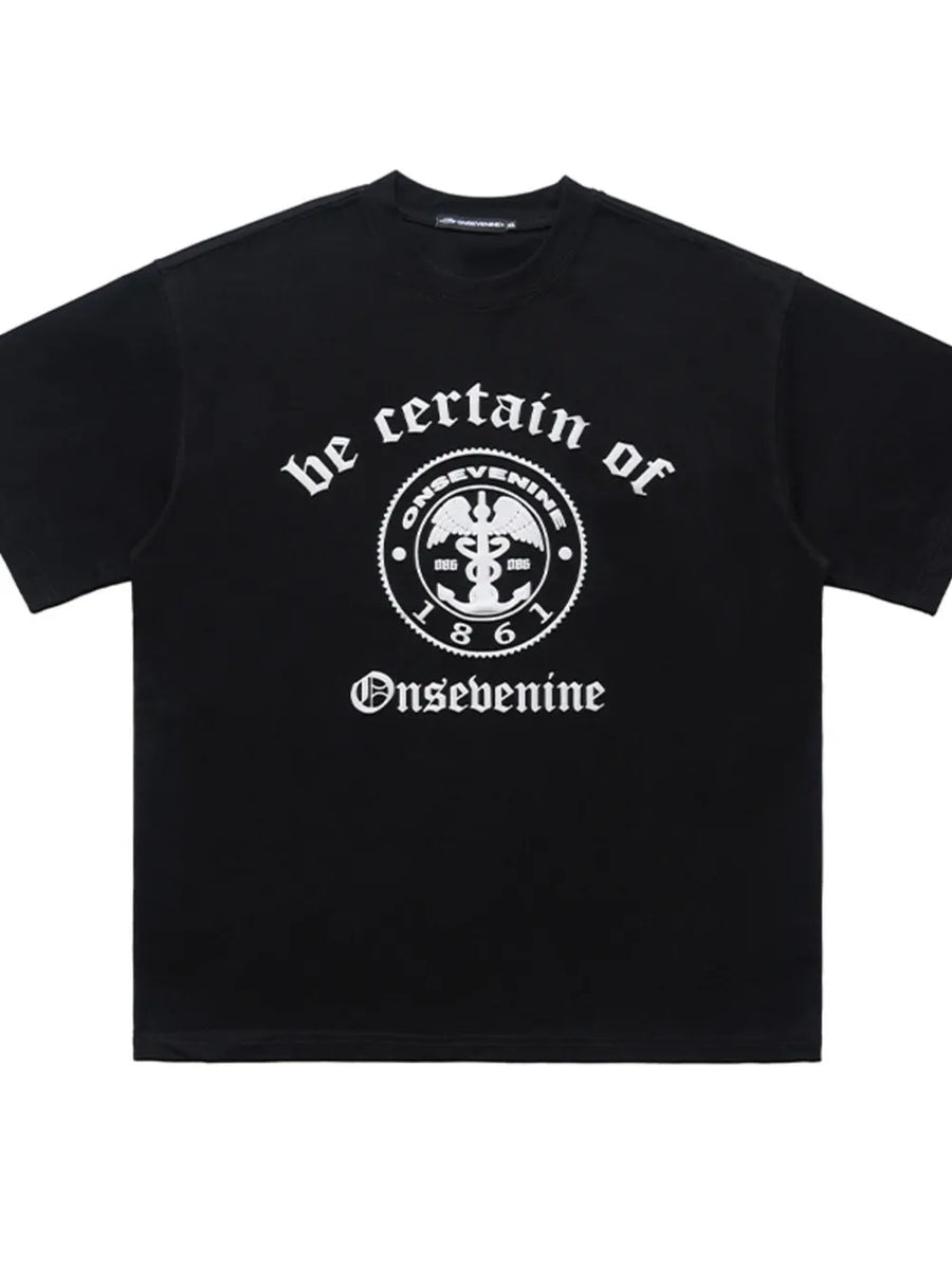 Black oversized graphic t-shirt with vintage-inspired print and crew neck.