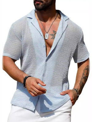 Light blue open-knit resort shirt with camp collar and short sleeves.