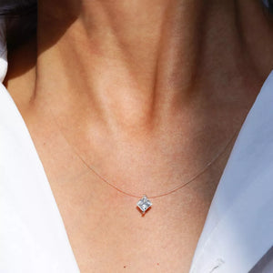 necklace in silver featuring moissanite stone and n/a fit