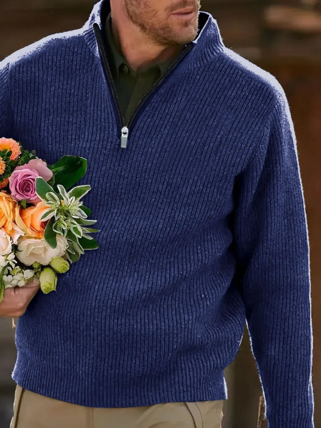 Textured ribbed quarter-zip sweater in navy with a dark green shirt underneath.