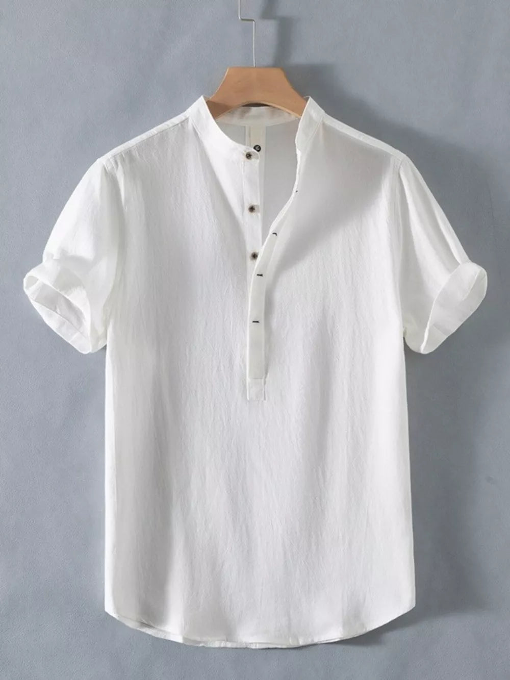 White cotton short sleeve shirt with band collar and button detail