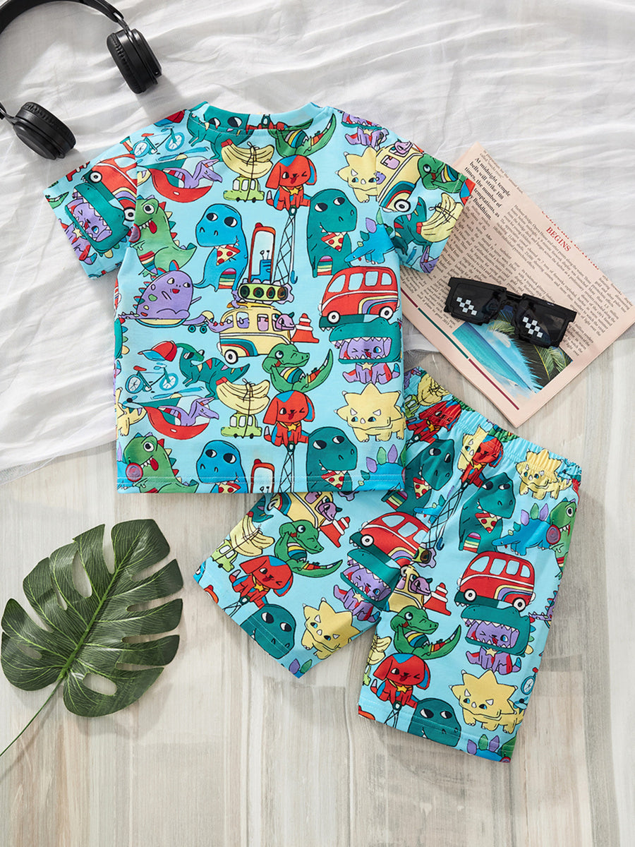 Toddler dinosaur print t-shirt and shorts set, light blue with cartoon dinosaurs and vehicles.