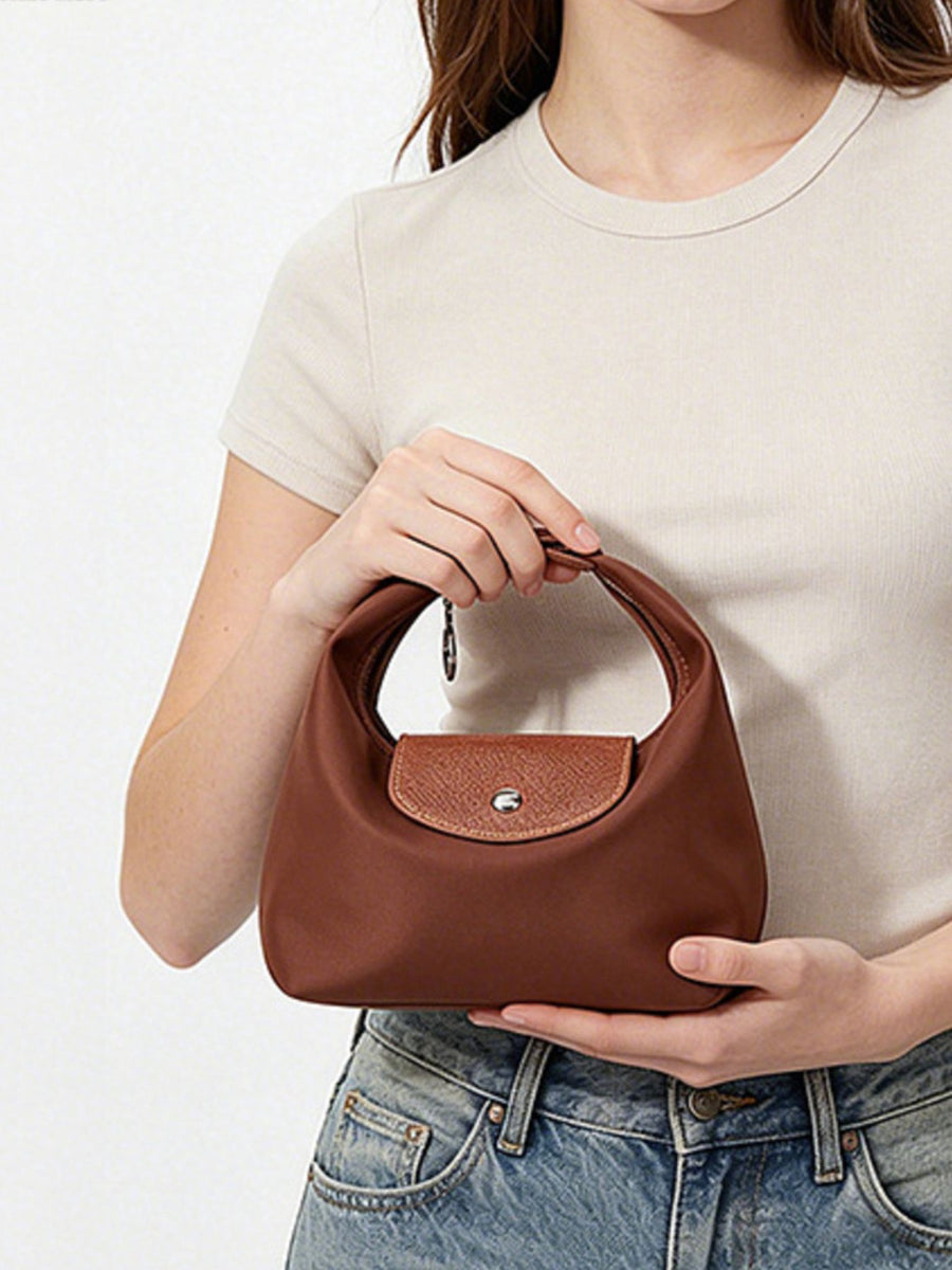 Oxford cloth Imported Size &amp shoulder bag in brown with curved silhouette