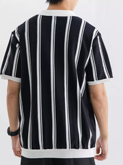 Black and white striped cotton polo shirt with white collar and cuffs.
