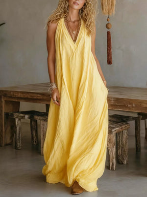 White loose maxi dress with deep v-neck