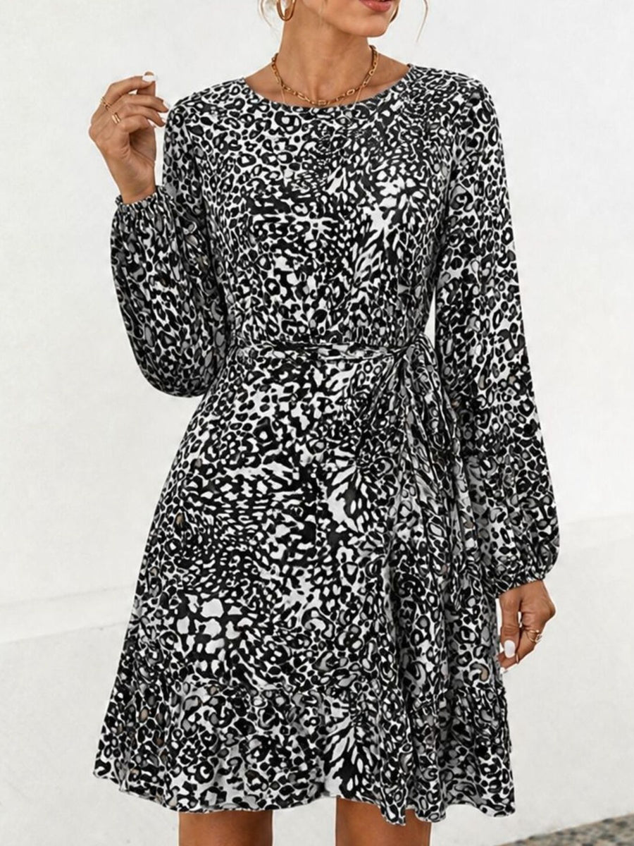 white mini dress featuring tied and leopard-print