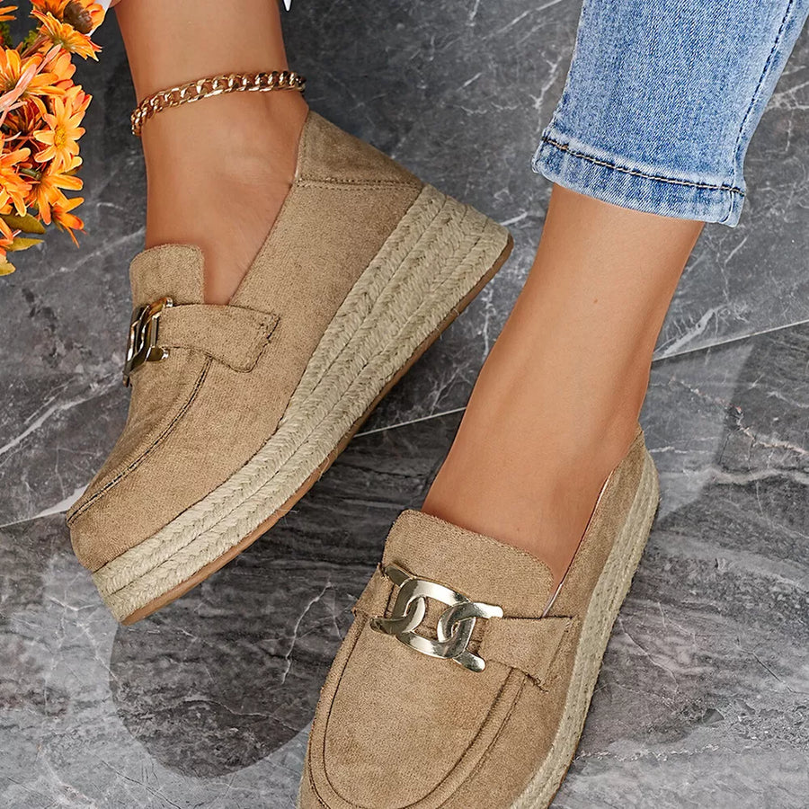 Chic brown round toe platform loafers with gold chain detail and espadrille sole.