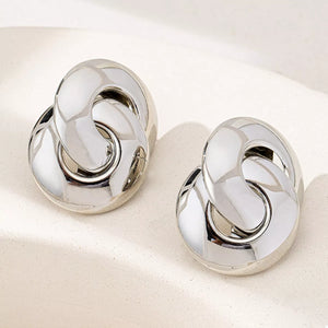 Chunky knot silver-plated earrings with a polished finish.