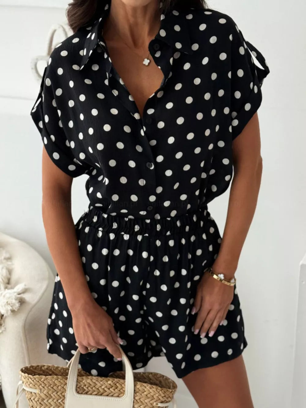 shirt and shorts set featuring polka dot in black with 100% polyester Care instructions: Machine wash cold texture