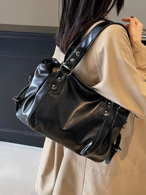 Large black vintage PU leather shoulder bag with silver hardware details.