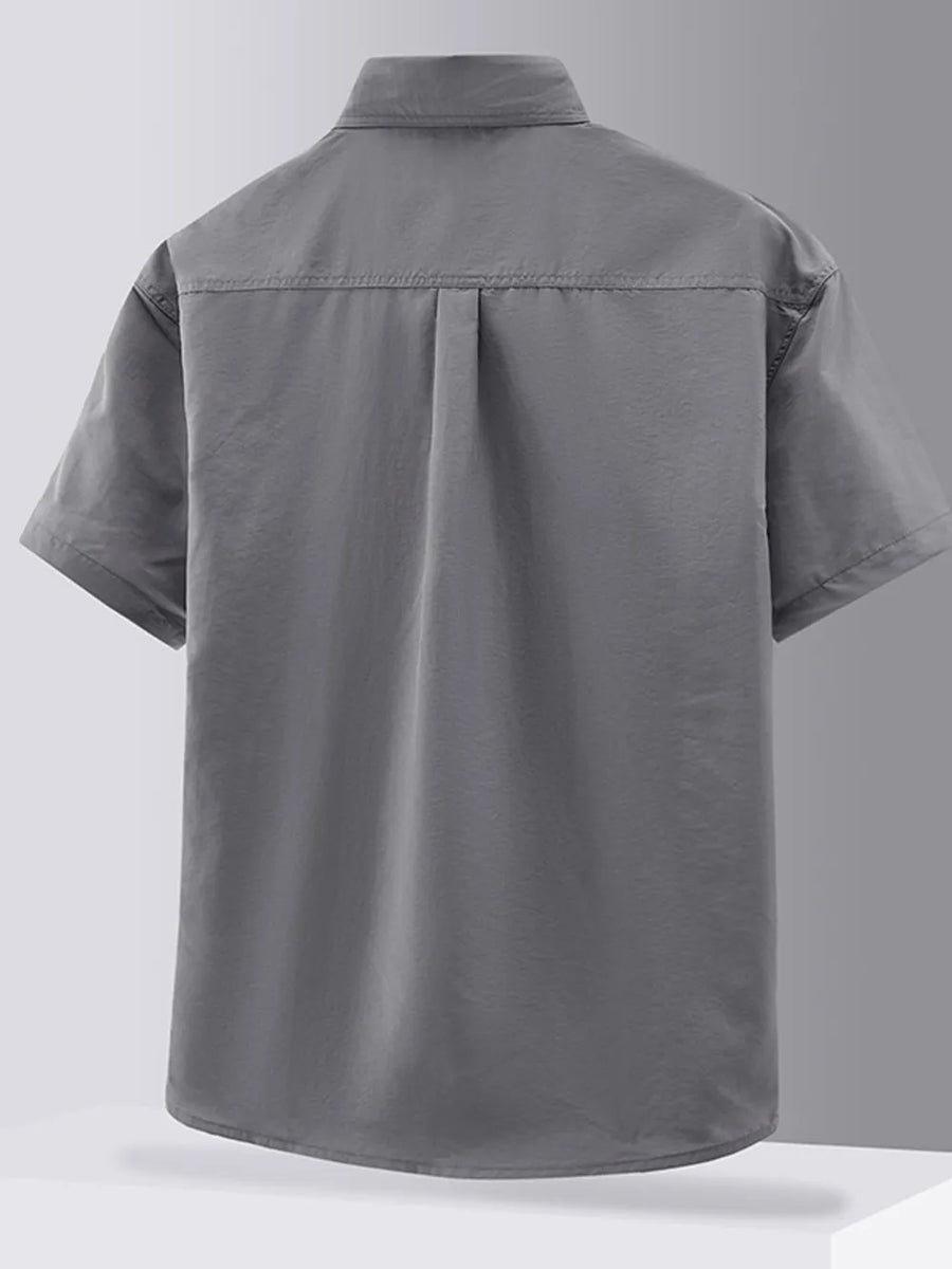 Grey short sleeve button-down shirt with back pleats and collar detail