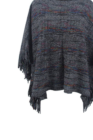 Multicolor knit poncho with fringe detail in charcoal, featuring subtle rainbow stripes.