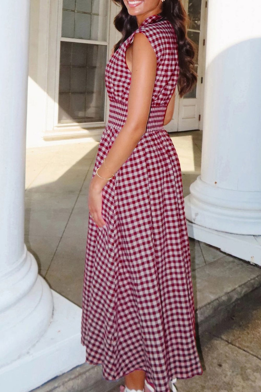 Gingham zip-front midi dress in cerise cotton with smocked waist and sleeveless design.