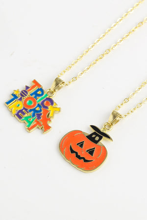 Spooky Season enamel pendant necklaces, one with colorful "Trick or Treat" text, one with a jack-o-lantern.
