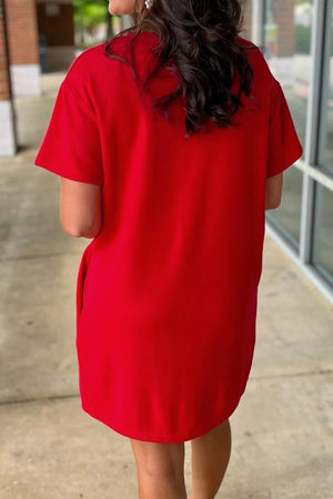 Red cotton mini dress with short sleeves and pockets.