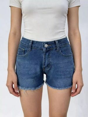 Classic blue denim shorts with frayed hem and button fly.