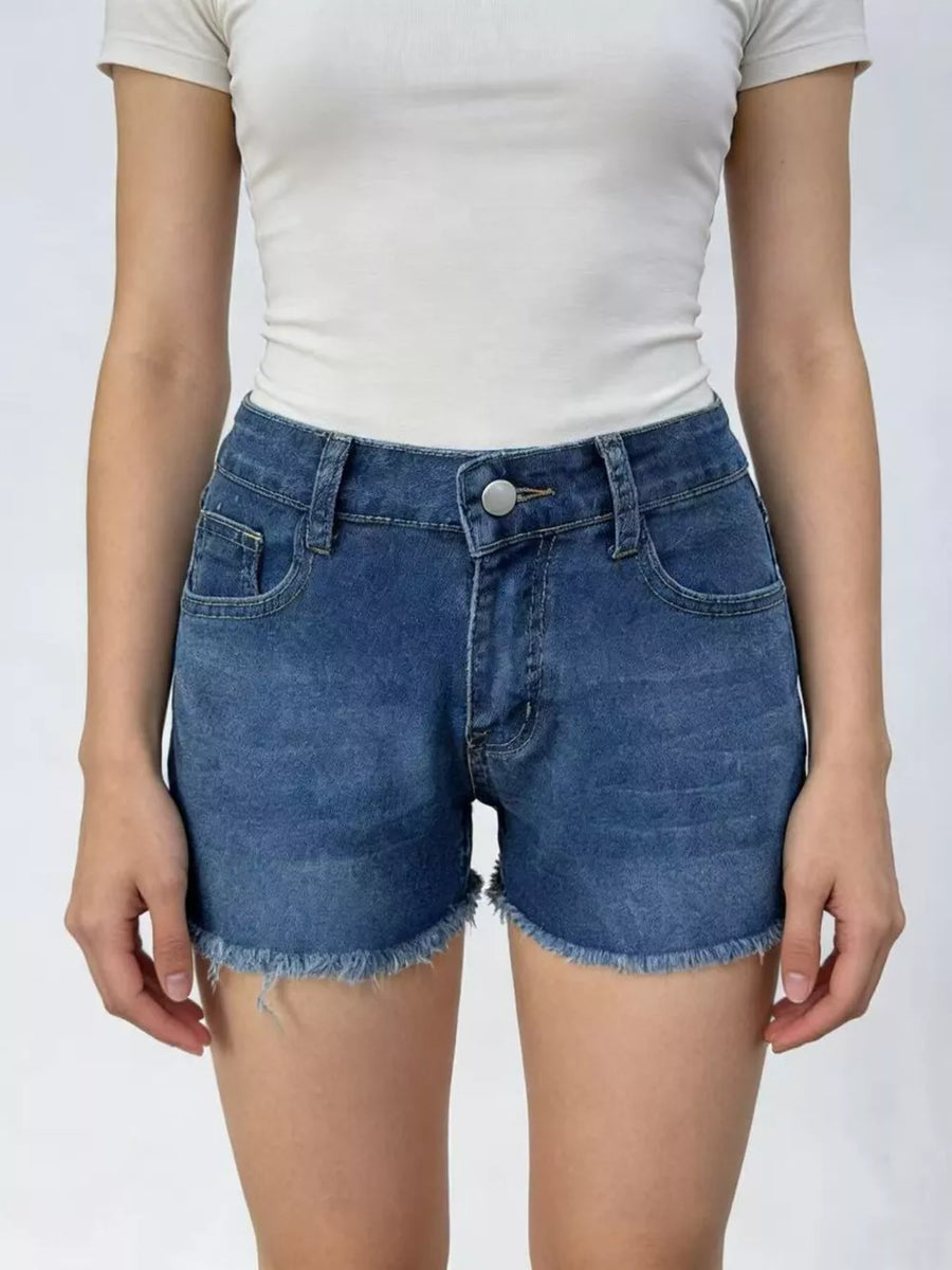 Classic blue denim shorts with frayed hem and button fly.